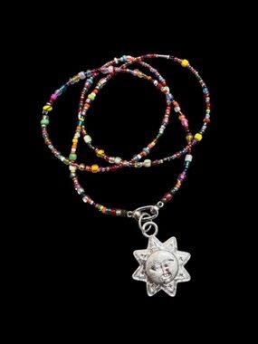 Sun Charm Long Bead Necklace.